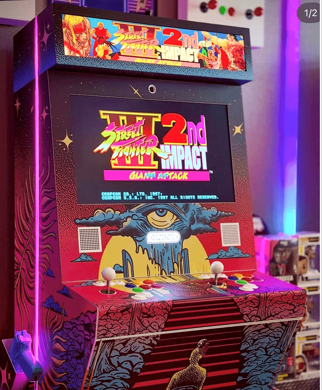 Street Fighter II arcade cabinet photographed with custom illustrated Polycade artwork